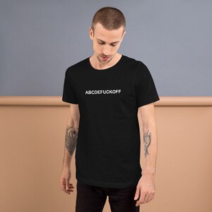 May include: A black t-shirt with the text "ABCDEFUCKOFF" printed in white on the front.