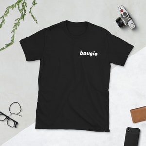 May include: Black t-shirt with the word "bougie" printed in white on the front.