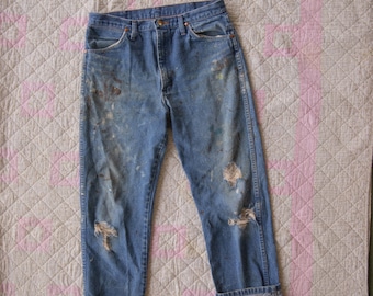 90s vintage wrangler jeans with paint and rips