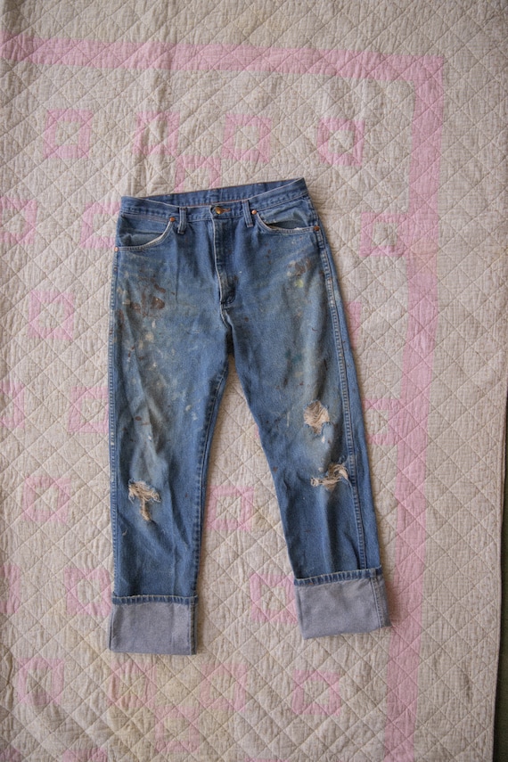 90s vintage wrangler jeans with paint and rips