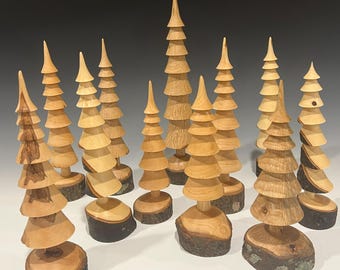 Turned wooden Christmas trees made from local cherry, pear and oak branches