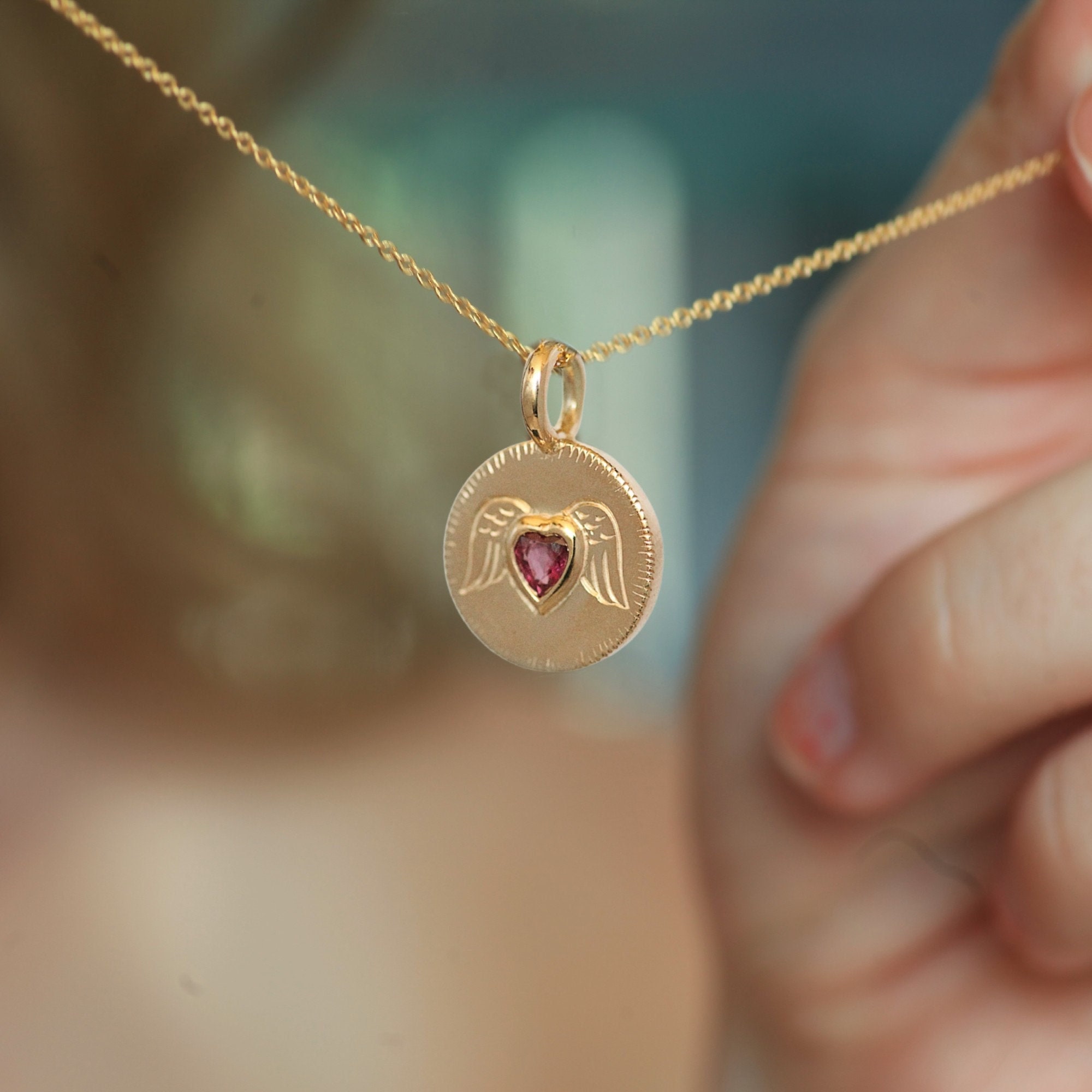 Ruby angel necklace deals
