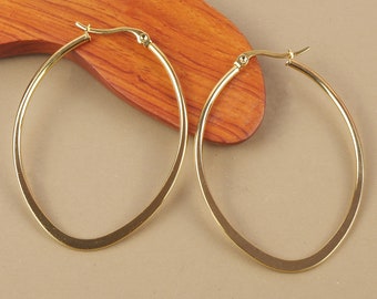 Boucles d'oreilles créoles ovales 55 mm x 40 mm en acier inoxydable hypoallergénique dorées à l'or fin