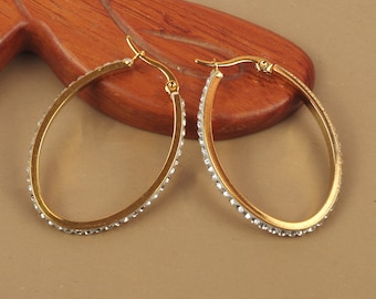 Boucles d'oreilles créoles ovales 45 mm avec pourtour strass en acier inoxydable hypoallergénique dorées à l'or fin