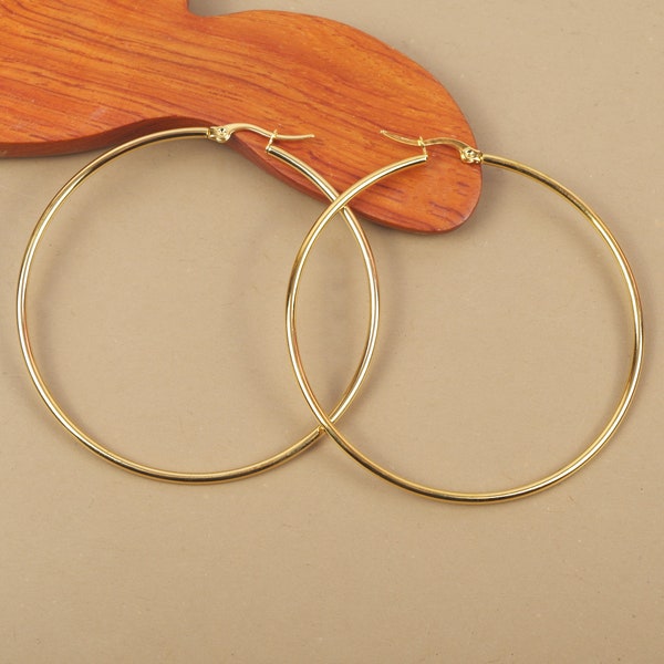 paire d'anneaux créoles rondes  65 mm couleur dorée en acier inoxydable hypoallergénique dorées à l'or fin