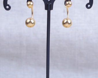 Stud earrings with 2 beads in hypoallergenic stainless steel gilded with fine gold