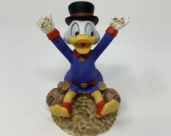 ヴィンテージのスクルージ・マクダックおじさんとコインのピン - Etsy 日本