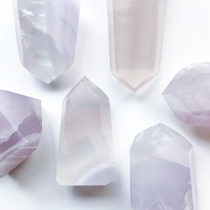 Chonky Yttrium Lavender Fluorite Points- very beautiful milky lavender. One of a kind and hand selected for beauty and form. 50-80g you pick