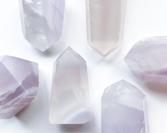 Chonky Yttrium Lavender Fluorite Points- very beautiful milky lavender. One of a kind and hand selected for beauty and form. 50-80g you pick