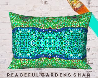 May include: A green, blue, and white patterned pillow sham with the text "Peaceful Gardens Sham Standard" at the bottom.