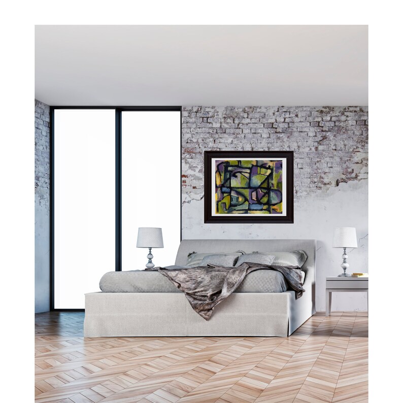May include: A bedroom with a white brick wall, a large window, and a bed with a gray headboard and a white duvet. A framed abstract painting with black lines and colorful shapes hangs on the wall above the bed.