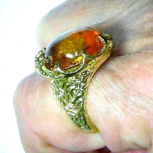 May include: A set of three ceramic mugs with a speckled, matte finish. The mugs are in shades of cream, light gray, and dark gray. Each mug has a simple, minimalist design, perfect for coffee or tea.