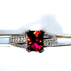 Radiant cut Lab Ruby Red CZ Ring, Emerald shape, with diamond simulate, CZ accents, size 9, one only
