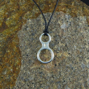 Figure 8 , big pendant climber in sterling silver 925 - made in Italy