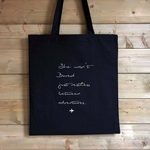 She wasn&#39;t bored, just restless between adventures travel Cotton Shopper Tote Canvas Bag