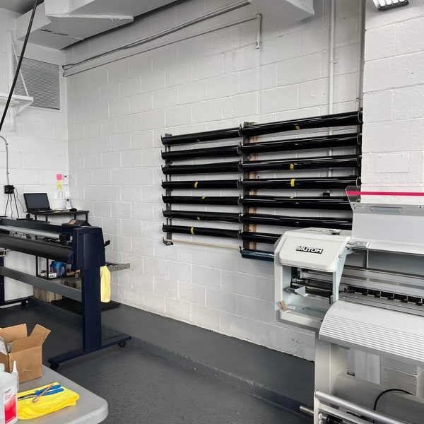 Wall Mounted Tint and Vinyl Wrap rack: The Perfect Solution for Organizing Your Wrapping Supplies