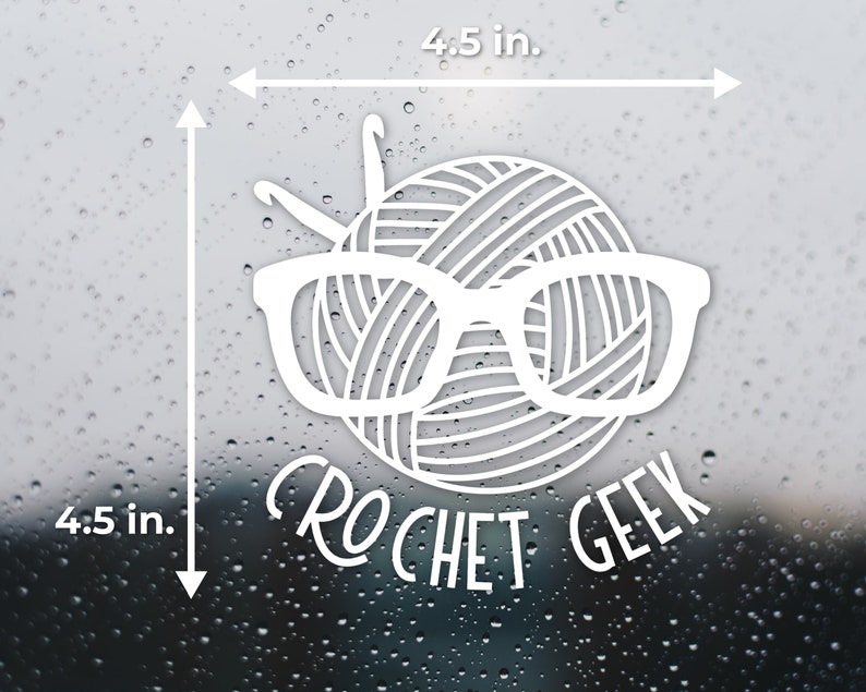 May include: White vinyl sticker of a yarn ball wearing glasses with the text "CROCHET GEEK" underneath. The sticker is 4.5 inches wide and 4.5 inches tall.