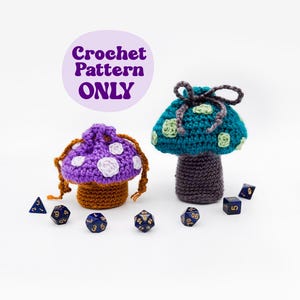 May include: Two crocheted mushroom-shaped dice bags, one purple and white, the other teal and green, with a crocheted drawstring.  The bags are surrounded by blue and gold dice.  The text "Crochet Pattern ONLY" is in a purple circle.