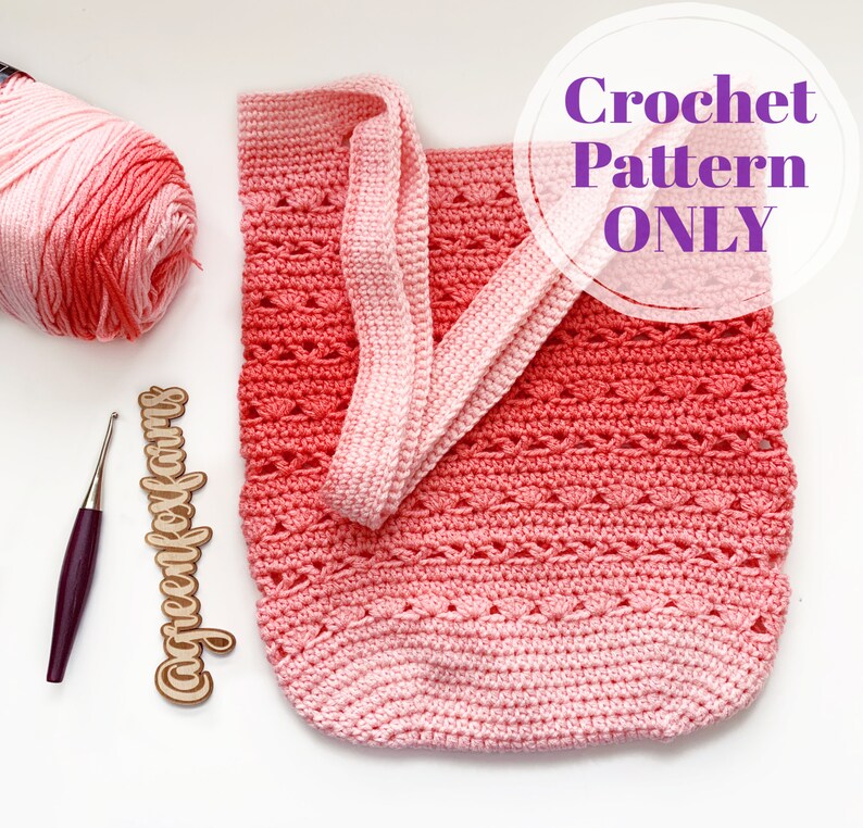 May include: A crochet pattern for a pink and red ombre tote bag with a crocheted handle. The pattern is available for purchase. "Crochet Pattern ONLY" is written in purple text on a white circle.