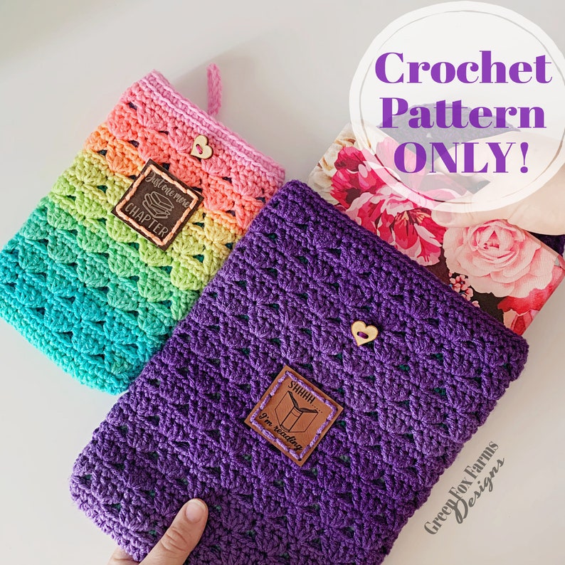 May include: Two crocheted book covers, one in rainbow colors with the text "Just one more chapter" and the other in purple with the text "Shhh... I'm reading".