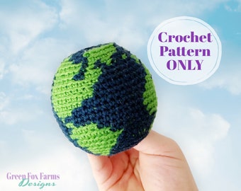 May include: Crochet pattern for a green and blue globe. The pattern is available for purchase. The text "Crochet Pattern ONLY" is written in a white circle with a purple outline.