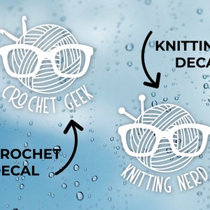 May include: Two white vinyl decals with a ball of yarn wearing glasses. The top decal says "Knitting Decal" and the bottom decal says "Knitting Nerd". The left decal says "Crochet Decal" and the bottom decal says "Crochet Geek".