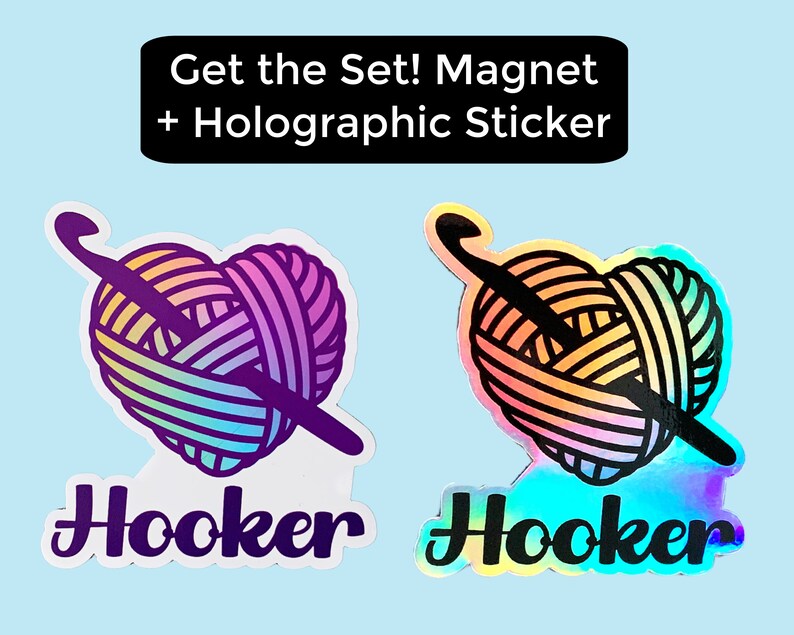 May include: A set of two stickers featuring a heart-shaped ball of yarn with a crochet hook. One sticker is a regular sticker, and the other is a holographic sticker. Both stickers have the word "Hooker" printed below the yarn ball.