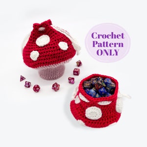 May include: Crochet pattern for a red and white mushroom-shaped dice bag. The bag is filled with colorful dice. The text "Crochet Pattern ONLY" is on a purple circle.