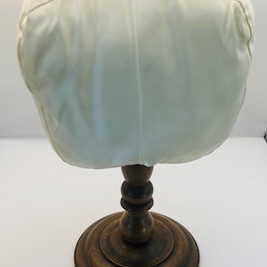 Wooden hat display stand with satin ‘head’ pad: milliners stand child bonnet holder