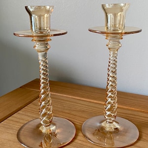 Pair of iridescent barley twist glass candlesticks , Pair of 9” glass candleholders, pair amber glass candleholders