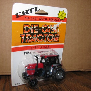 May include: A red and black 1/64 scale die-cast Case International 329 tractor toy in a plastic package. The package has the ERTL logo and the words "Die-Cast Tractor".
