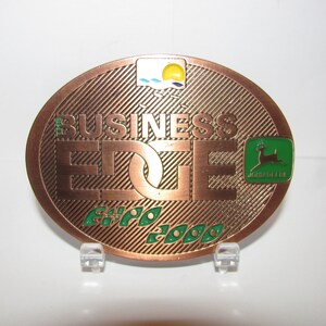 John Deere Melbourne Australia Business Edge Expo 2000 Copper Color Enamel Belt Buckle Limited Edition 1 of 2 MASTER  1968 Trademark Logo jd