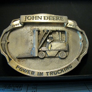 John Deere Forklift Fork Truck &quot;Power In Trucking&quot; 1996 Brass Belt Buckle Limited Edition Manufactured by HD jd collectible