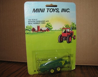 1/64 Mini Toys Inc Stock #641 ÉPANDEUR d’épandage d’épeautre vert avec pneus en caoutchouc Émis dans les années 1980 John Deere & Oliver Color ertl vache cheval ferme