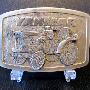 Vintage YANMAR Tractor Pewter Belt Buckle Manufactured by Spec Cast of Rockford Illinois advertising agriculture farm collectible 1970&#39;s