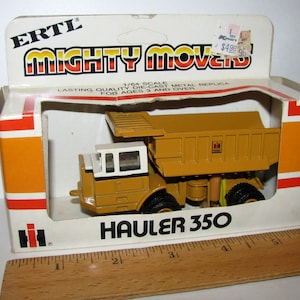 IH International Harvester 350 Hauler Off Road Dump Truck 1/64 Mighty Movers Ertl Toy #1852 Die Cast Metal Construction Collectible