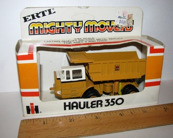 IH International Harvester 350 Hauler Off Road Dump Truck 1/64 Mighty Movers Ertl Toy #1852 Die Cast Metal Construction Collectible