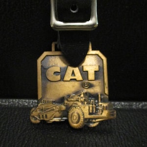 Caterpillar Cat DW21 Scraper Tractor Earth Mover Pocket Watch Fob Advertising Promo Manufactured by Leavens Mfg of Attleboro, MA Brass