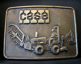 Case Construction DH4 Trencher Tractor Backhoe Digger Brass Belt Buckle Collectible 1980's utility repair work Trademark Logo