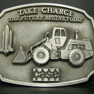 J I Case Parts Trade Fair W30 Wheel Loader "Take Charge" Belt Buckle 1988 Manufactured by Spec Cast Road Construction Space Shuttle Rocket