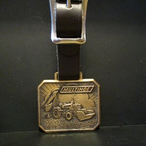 Multihoe MDA LDA KDF Backhoe Loader Tractor Brass Pocket Watch Fob Construction Advertising Promo Collectible