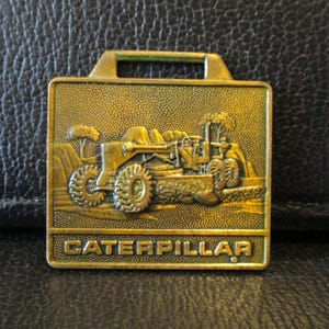 May include: A handmade wooden sign with the text "Welcome" in a playful font. The sign features a distressed white background and a dark brown border, perfect for a front door or entryway. Measures approximately 12 inches wide.