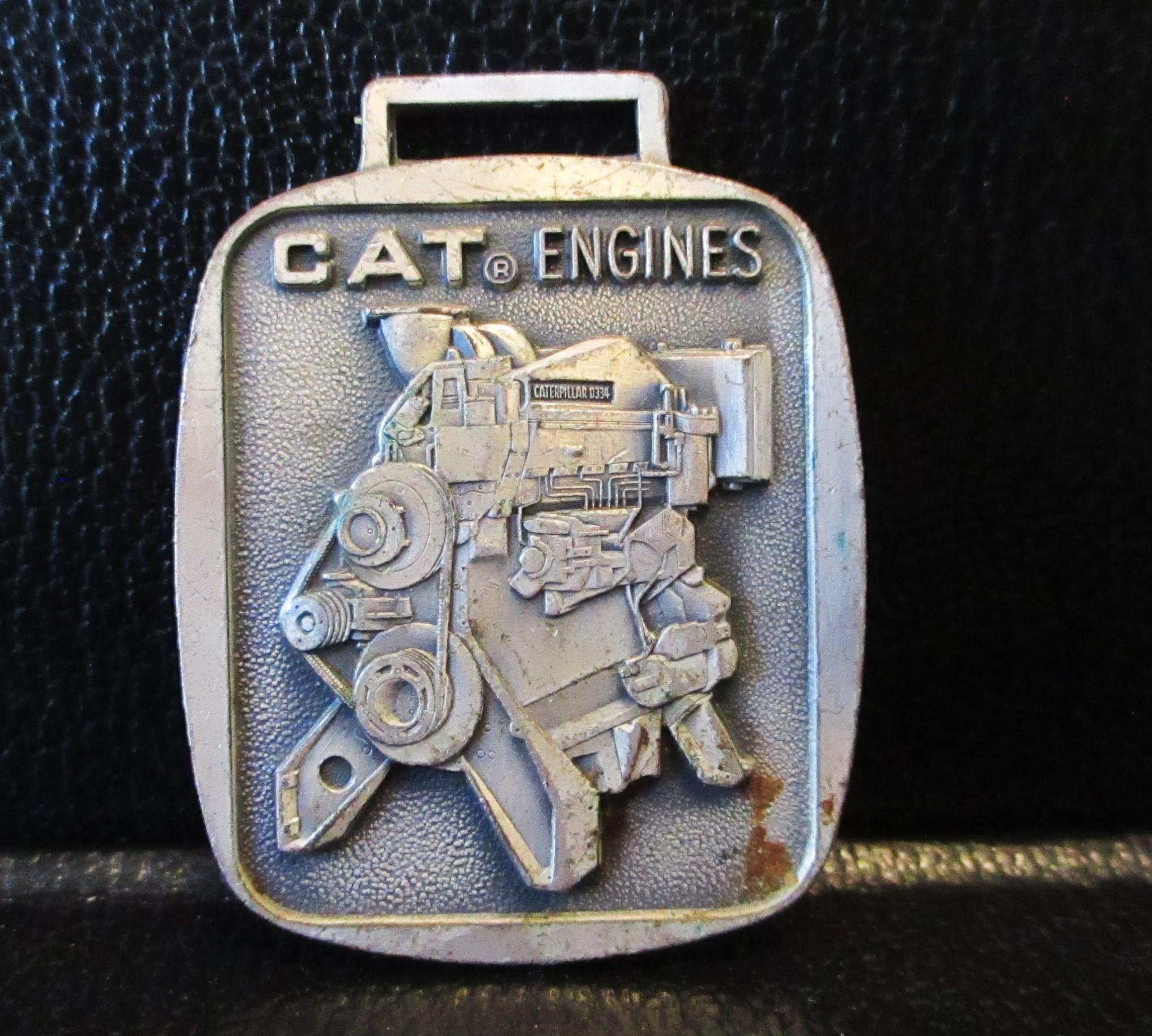1960's CATERPILLAR Raschietto Trattore Motivo Ind Orologio Fob Rockford