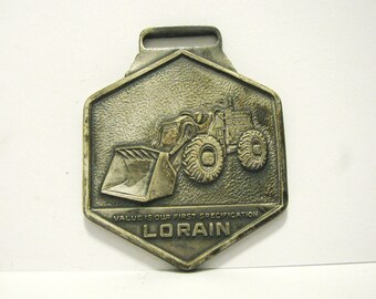 Lorain Truck Crane & Tractor Shovel Loader Construction Advertising Watch Fob   Made of Metal
