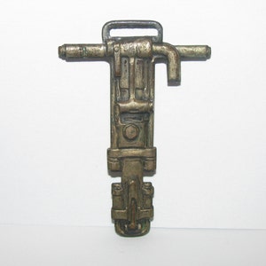 GARDNER DENVER COMPANY Jackhammer Metal Pocket Watch Fob Advertising Promo Mining Road Construction Asphalt Rock Quarry