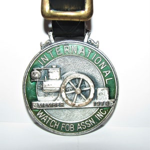 International IH Hit & Miss Stationary Engine Watch Fob 1978 IWFAI International Watch Fob Association Inc Member No. 1955 Richard Greslick