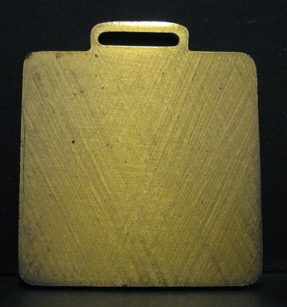 Vintage LeTourneau Equipment Advertising Watch Fob Non Magnetic Brass Tone il_fullxfull.3661887146_8cgu.jpg main image 3