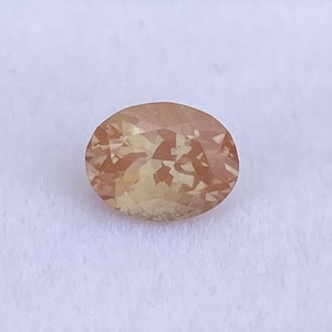 Natural Oregon Sunstone, Oval Shape Faceted, 2.00Cts 7.1 x 9.1 x 5.6mm 100% Natural AAA Rare! Pink Schiller Oregon Sunstone For jewellery.