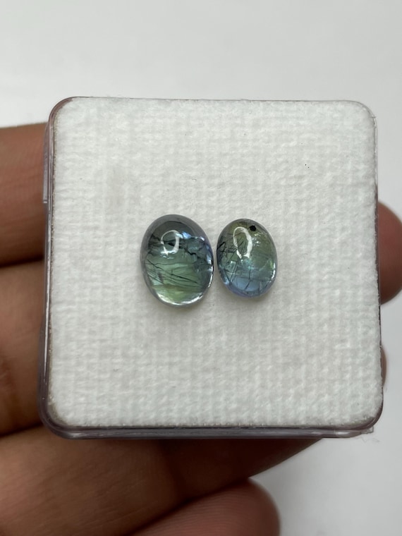 Natural Unheated Bio Rutile Tanzanite Cabochons Loose Gemstone Oval Shape, 2 Pieces Lot, Size 8x6x4.2 —/— 9.5x7.3x5 MM, Weight 4.90 Cts.