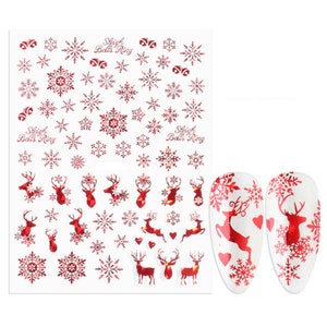 May include: Red and white Christmas nail stickers with snowflakes, reindeer, and the text "Sleigh Bells Ring".